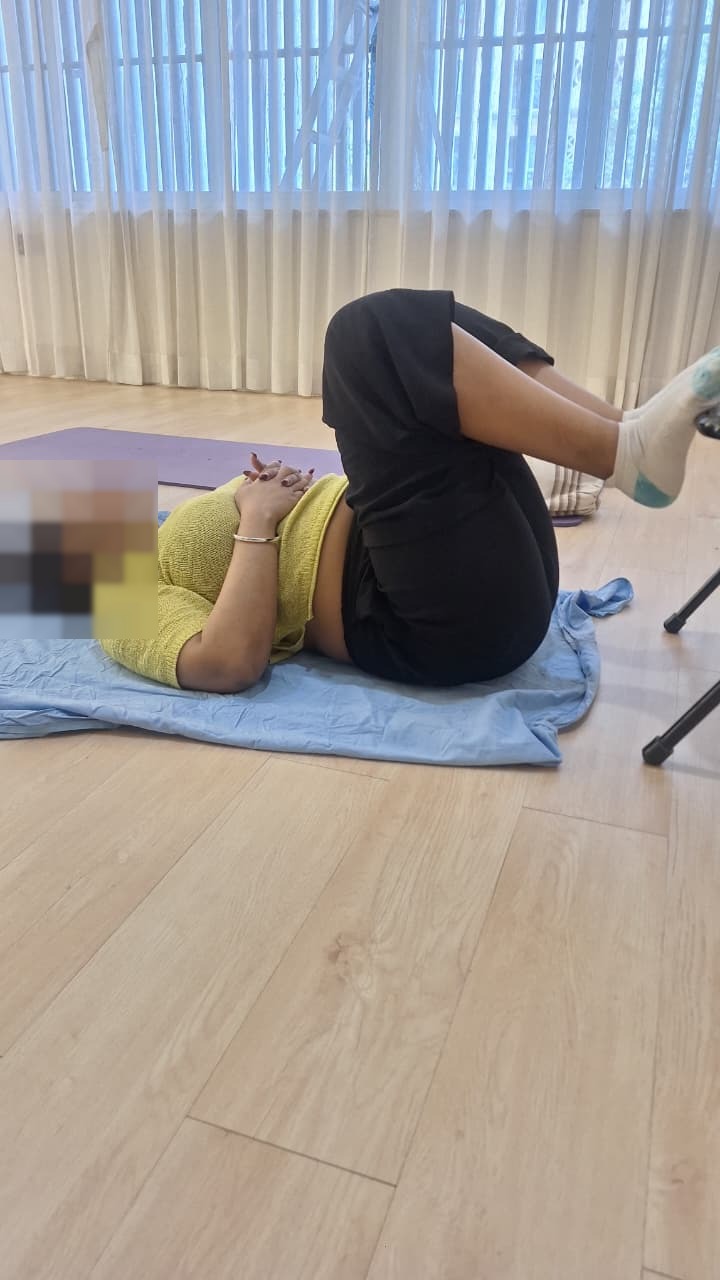 Postnatal yoga and recovery session at Aura Studio by Yogtatvah Wellness & Beyond